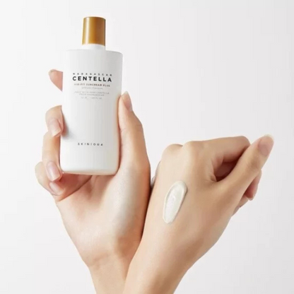 קרם הגנה SPF50 'פלוס' מועשר בתמצית סנטלה ממדגסקר 50 מ"ל - SKIN1004