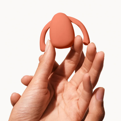 ויברטור לדגדגן Eva  בצבע כתום ללא שימוש בידיים - Dame